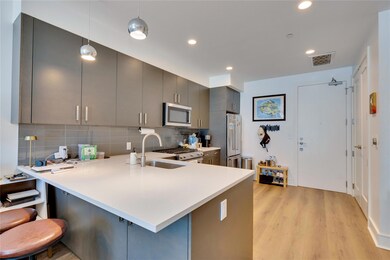 Kitchen featuring high quality appliances, a peni