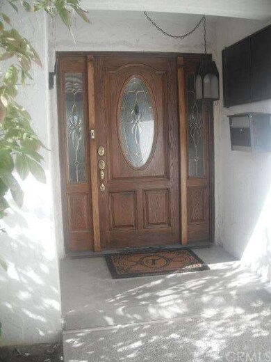 Newer front door inside courtyard.
