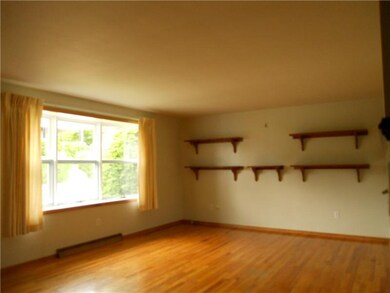 Living Room. Spacious Living Room W/Hardwood Floor