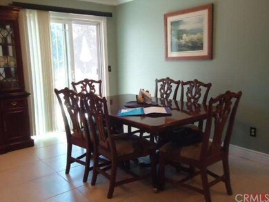Lovely dining room area with slider door. Door lea