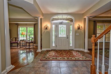 Gracious entry way welcomes you into the house