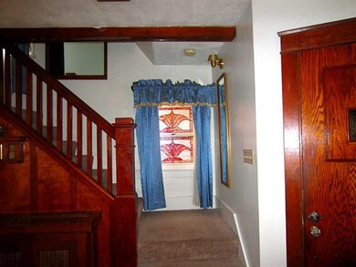 Living Room. The Wood along the Stairs showcases t