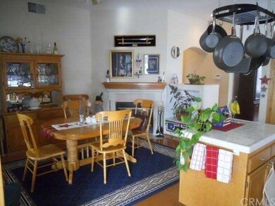 FAMILY ROOM WITH FIREPLACE AND MEDIA NICHE.