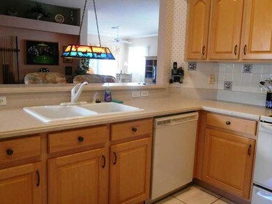 Kitchen. Eat in area, overlooking side yard.