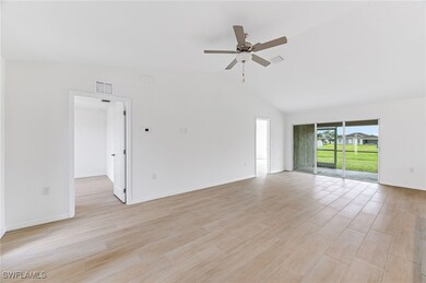 Spare room featuring light wood-type flooring, cei