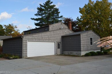 Side loading oversized 2 car garage with tons of s