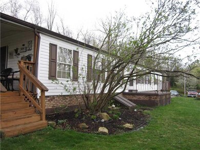 Exterior Front. The owner tells me this lilac tree
