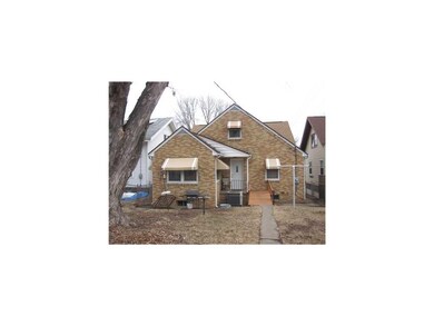 Exterior Back. Awings cover all of the windows and