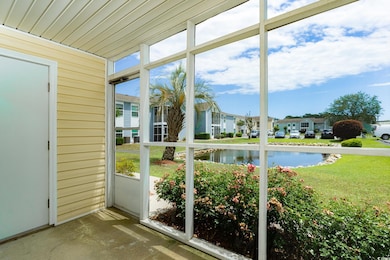 Unfurnished sunroom with a water view and a reside