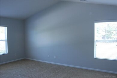 master suite w/ vaulted ceiling