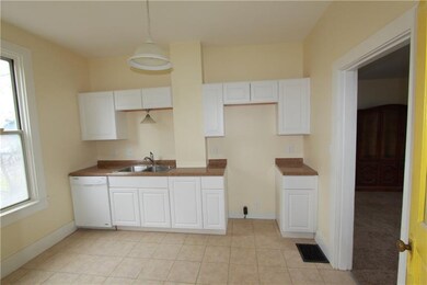 Kitchen - New tile flooring,faucet,cabinets,fresh 