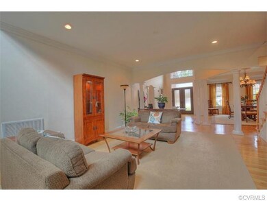 Wood floor and center stair way front and back.