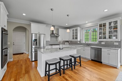 Center island kitchen with dedicated coffee/tea station, large walk in panty
