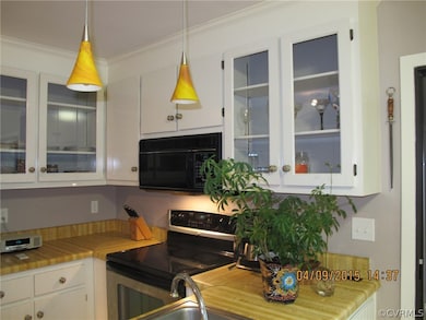 Kitchen with refaced cabinets