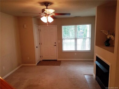 Spacious living room with coat closet and lots of 