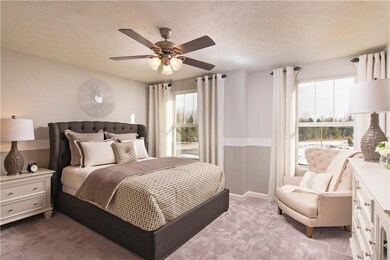 Photo is of a similar home or model.