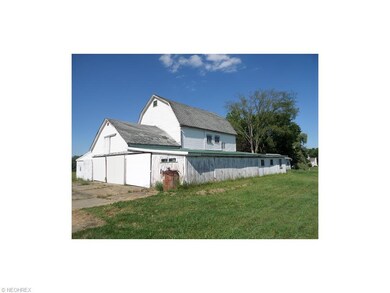 Back side view of the barn.  2 slider doors for tr