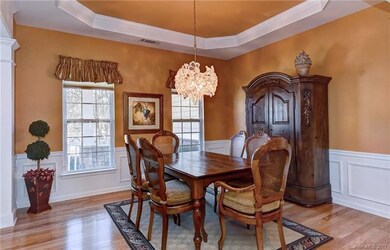 Dining room with picture and chair  molding along 