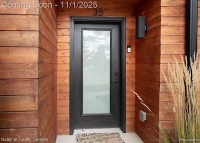 Inviting entryway to your new condo at the beautiful Harrison Collection