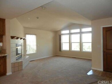 Open floor plan with vaulted ceilings