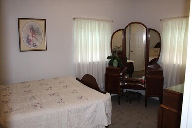Second bedroom on main floor.  Brand new carpet in