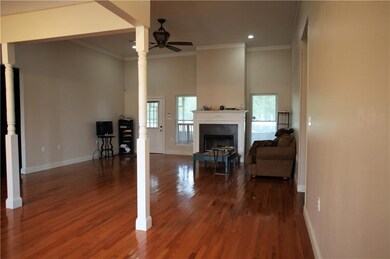 Living room includes 10 ft ceilings with crown mol