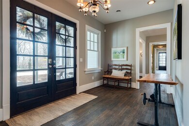 The charming home is inviting and spacious with over 9000 sq ft in the main house.