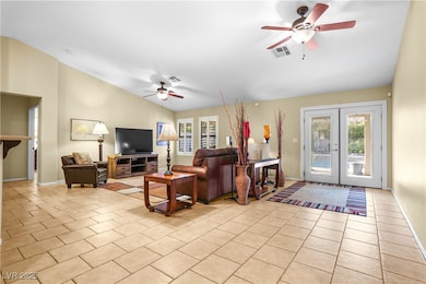 Spacious living area with vaulted ceilings, ceilin