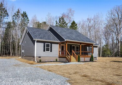 View of front of home featuring crawl space, a shi