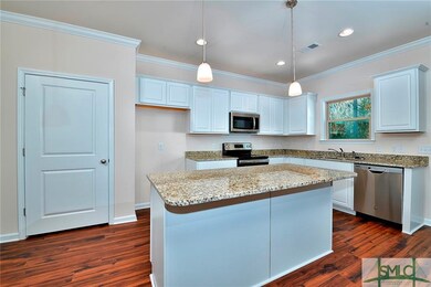 photo is of another completed home of the same flo