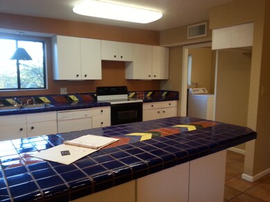 Kitchen next to Lg Laundry Room