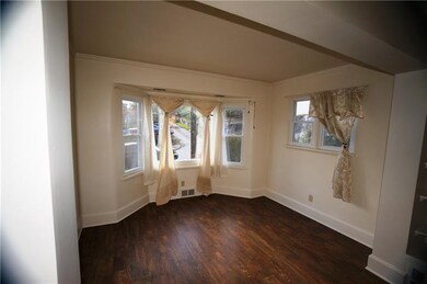 Charming main level den or sunroom...open to livin