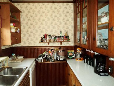Kitchen. Lots of storage in the tall glass cabinet