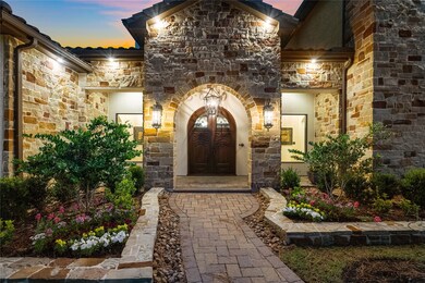 Beautiful Lighting and Lush Landscaping add a welc