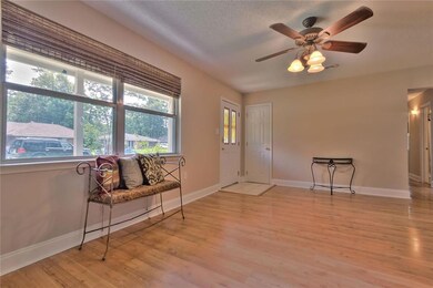 Laminate wood floors in living and hallway area...