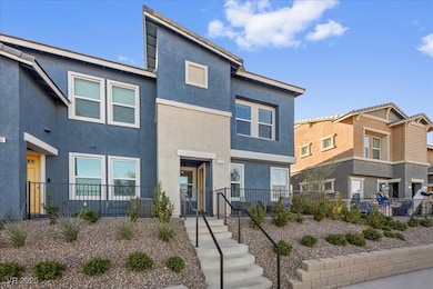 Exterior front includes desert landscaping.