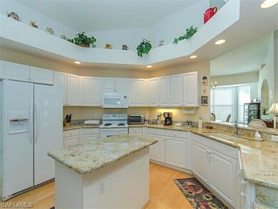 Large kitchen with granite, skylight, breakfast ba