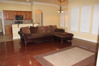 LIVING ROOM: Lots of sunny windows. Recessed light
