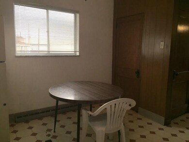 Eat in area of kitchen with space for a table and 