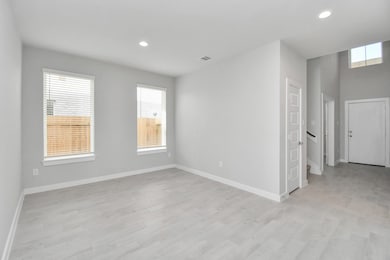 Make memories gathered around the table with your family and friends! This spacious dining room features elegant flooring, custom paint, and adjacent to family room and kitchen for open concept feel. Sample photo of completed home with similar floor plan. Actual colors and selections may vary.
