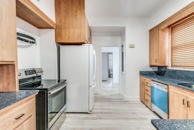 Kitchen featuring appliances with stainless steel 