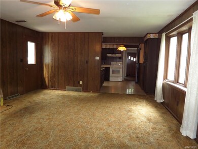 Family Room Looks in to Kitchen. Bow Window looks 