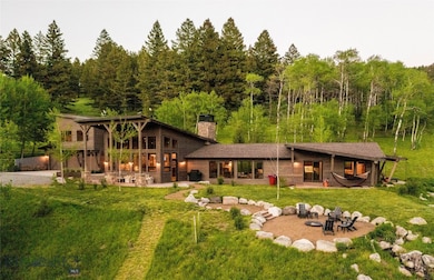 The cedar sided custom home features unrivaled vie