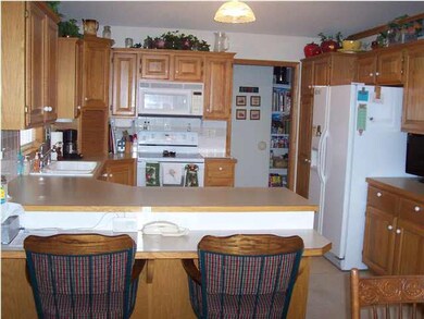 Kitchen. Lots of cabinets and counter top space pl