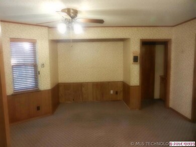 Dining room has allocated space for large hutch