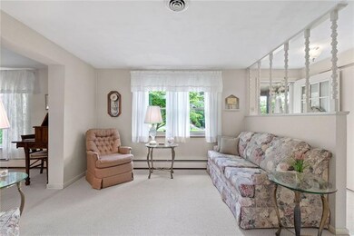 living room/sitting room with beautiful windows!!