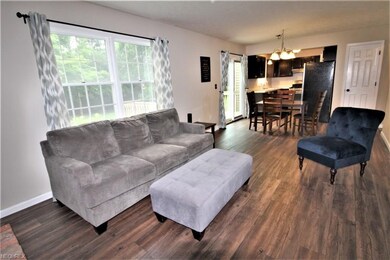 Family Room Features a Beautiful Picture Window an