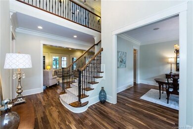 2 story Foyer w/Brazilian walnut hardwoods & main 