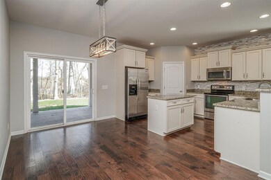 Kitchen and Dining Area Leading to Outdoor Living 