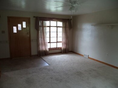 Another view of the living room from the front doo
